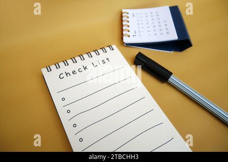 Top View Checklist Book With 2024 Calendar And Green Plant New Year 2024 Goals Resolutions Plan Action Checklist Concept Copy Space Similar Im 2tbchh3 