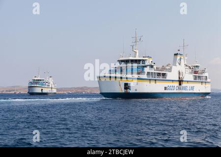 Gozo, Malta - August 27, 2019: MV Ta Pinu and Gaudos ferry ships by The Gozo Channel Company Limited, commonly known as Gozo Channel Line or the Gozo Stock Photo