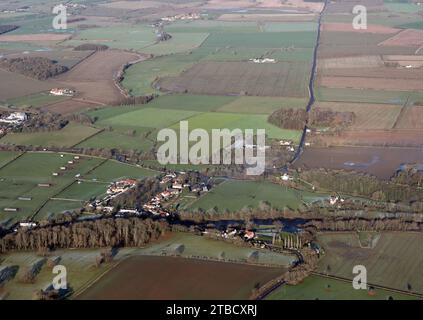 Aerial view of Piercebridge village and Dere Street Roman road (B6275) running North. County Durham Stock Photo