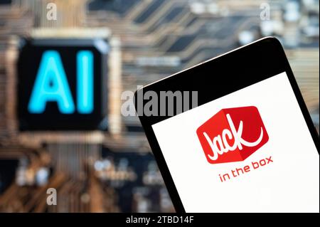 China. 03rd Nov, 2023. In this photo illustration, the American fast-food restaurant chain Jack in the Box logo seen displayed on a smartphone with an Artificial intelligence (AI) chip and symbol in the background. (Photo by Budrul Chukrut/SOPA Images/Sipa USA) *** Strictly for editorial news purposes only *** Credit: Sipa USA/Alamy Live News Stock Photo