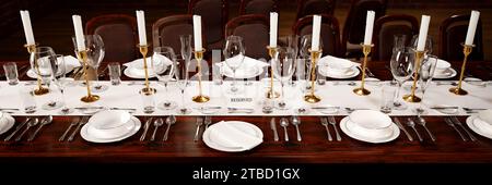 Exquisite Table Setup with Reserved Sign for an Upscale Dining Experience Stock Photo