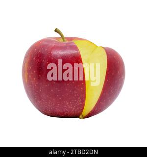 Red Jonagold apple with a slice cut off, isolated on white background with clipping path Stock Photo