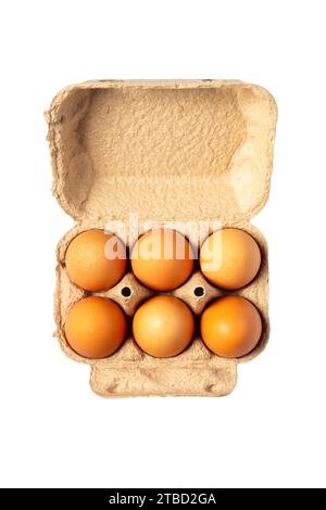 Six eggs in packaging paper mould box isolated on white background. Top view. Stock Photo