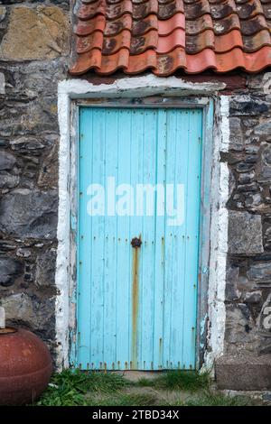 Crovie village cottage wooden door in November. Crovie, Aberdeenshire, Scotland Stock Photo