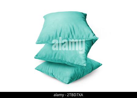 Stack of turquoise pillows isolated on white background. Pile of  decorative cushions for sleeping and resting, home interior, house decor. Stock Photo