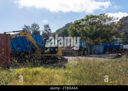 Felanitx, Spain; november 19 2023: General view of an open field with parked old industrial vehicles from the construction sector. Felanitx, island of Stock Photo