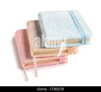 Stack of different notebooks isolated on white background Stock Photo