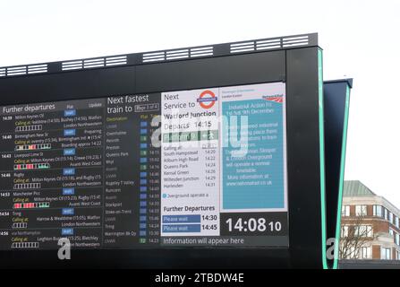 Departures board on Euston station Plaza warning of industrial action by ASLEF on December 9th 2023, in London, UK Stock Photo
