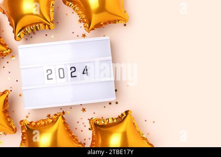 New Year 2024 with golden balloons on a light background Stock Photo by  AtlasComposer