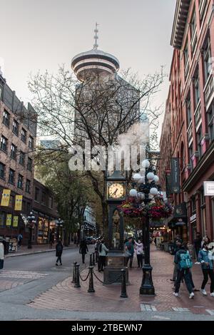 Vancouver, CANADA - Sep 29 2023 : Cityscape of Gastown in cloudy day. Famous steam-powered clock at Gastown (Gastown Steam Clock) seen in image. Stock Photo