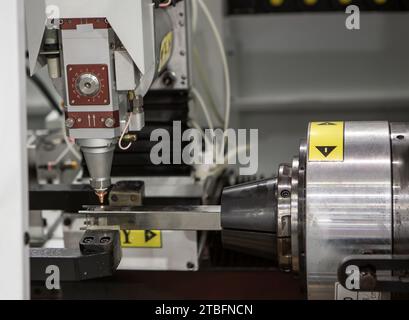 Pipe laser cutting machine. Industrial manufacture. Stock Photo