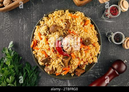 Large dish with Uzbek festive pilaf plov Stock Photo