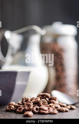 Sweet breakfast cereals on the kitchen table. Stock Photo