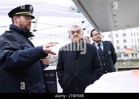 Duisburg, Germany. 06th Dec, 2023. Christoph Meurers shows the North Rhine-Westphalian Interior Minister Herbert Reul the new mobile video surveillance trailer in Duisburg. Credit: David Young/dpa/Alamy Live News Stock Photo