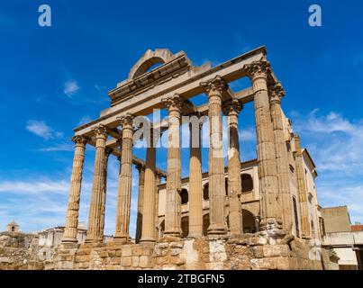Well-preserved archaeological remains of the Roman temple of Diana with well-preserved Corinthian style marble columns Badajoz province, Extremadura, Stock Photo