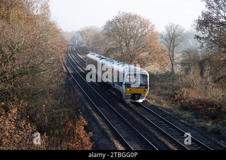 Chiltern Railways class 165 diesel train in winter, Hatton Bank, Warwickshire, UK Stock Photo