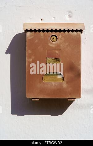 Old rusty metal mailbox Stock Photo