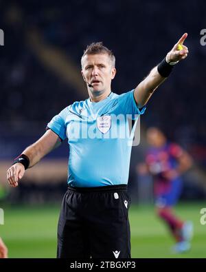 BARCELONA - NOV 28: The referee Daniele Orsato in action during the Champions League match between FC Barcelona and FC Porto at the Estadi Olimpic Llu Stock Photo