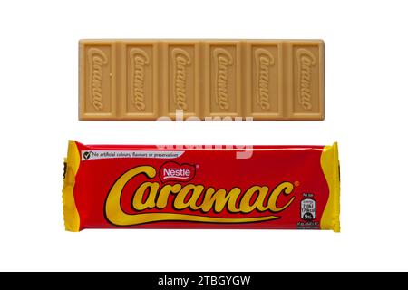 bar of Nestle Caramac chocolate opened to show contents isolated on ...