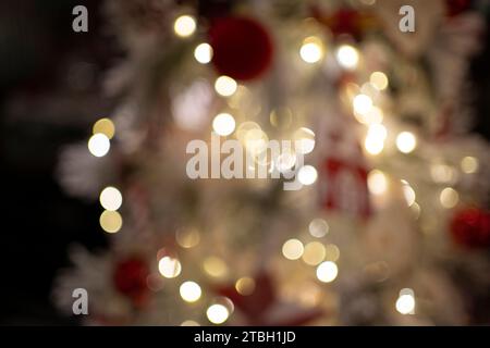 Bright and blurred lights provide a festive illumination effect, adding sparkle and warmth to the scene. Stock Photo