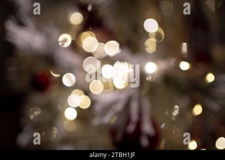 Bright and blurred lights provide a festive illumination effect, adding sparkle and warmth to the scene. Stock Photo