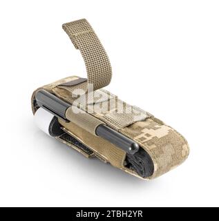Military pouch in pixel camouflage with strap for molle system and tourniquet and marker inside. Military gear. First aid kit tool for bleeding. Stock Photo