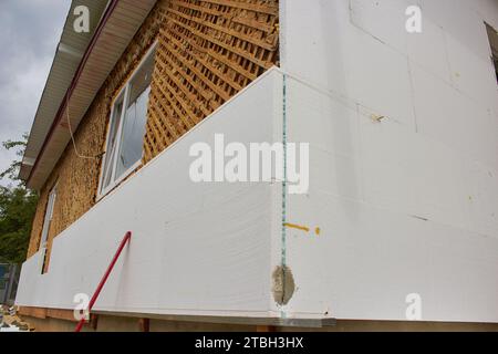 work on the insulation of the facade of the house Stock Photo