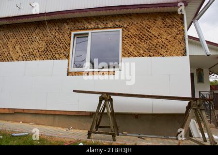 village house in the village to restore and insulate with foam Stock Photo