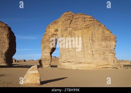 Geologist at Elephant Rock in the Arabian desert Stock Photo