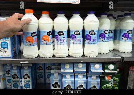 Fresh Milk plastic bottles in a store Stock Photo