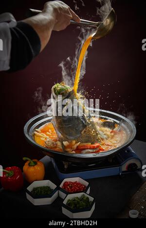 Steamed Fish Head with Diced Hot Red Peppers ，Chinese Hunan cuisine - chopped pepper head Stock Photo