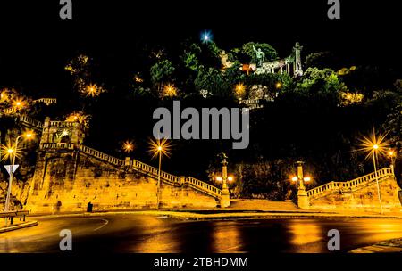 A view of the Gellert hill and the monument on the hillside in Budapest at night in summertime Stock Photo