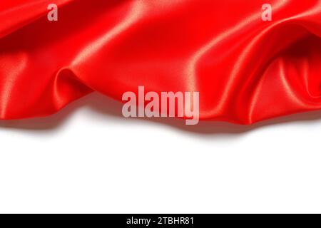 Red silk fabric white background Stock Photo