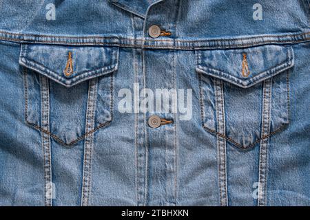 Top View of Blue Denim Pocket on Truckers Jacket Stock Photo