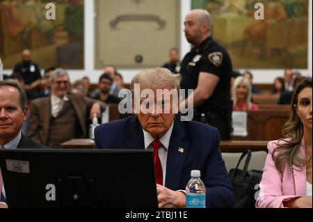 New York, United States. 06th Dec, 2023. Former President Donald Trump in the courtroom at State Supreme Court on Thursday, December 7, 2023 in New York City. The case brought last September by New York Attorney General Letitia James, accuses Trump, his eldest sons and his family business of inflating Trump's net worth by more than $2 billion by overvaluing his real estate portfolio. Photo Louis Lanzano/UPI Credit: UPI/Alamy Live News Stock Photo