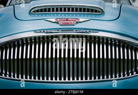 Front Radiator And Bonnet Of A Blue 1960's Austin Healey Mark III BJ8 Sports Convertible Vintage Classic Sports Car, UK Stock Photo