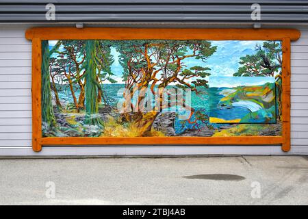 CHEMAINUS, CANADA - MAY 16, 2017: The mural 'By the Bay', made 2016 by Mario Labonte, is one of more than 40 murals at the town Chemainus attracting v Stock Photo