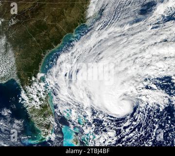 Satellite image of Tropical Storm Nicole as it strengthens over the Bahamas. Stock Photo