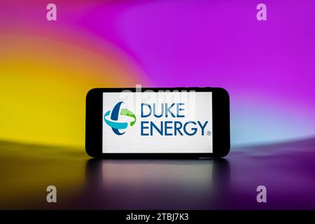 In this photo illustration, the DUKE energy logo is seen displayed on a mobile phone screen. Stock Photo