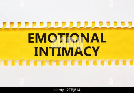 Emotional intimacy symbol. Concept words Emotional intimacy on beautiful yellow paper. Beautiful white paper background. Psychology emotional intimacy Stock Photo