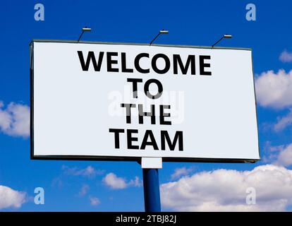 Welcome to the team symbol. Concept words Welcome to the team on beautiful big white billboard. Beautiful blue sky cloud background. Business, motivat Stock Photo