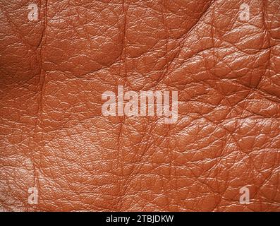 Brown leather texture background. Natural leather surface. Stock Photo