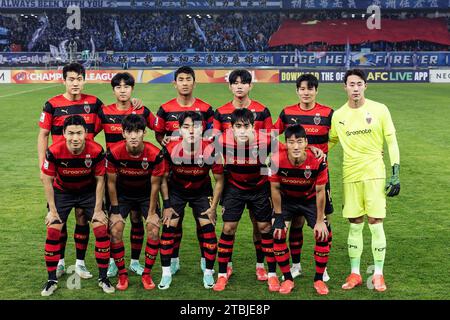 Wuhan, China. 06th Dec, 2023. Players of Pohang Steelers pose for group photos during the AFC Champions league football match between Wuhan Three Towns FC of China and Pohang Steelers of South Korea at Wuhan Sports Center Stadium. Final scores; Wuhan Three Towns FC of China 1-1 Pohang Steelers of South Korea. Credit: SOPA Images Limited/Alamy Live News Stock Photo