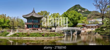 A pavilion on a small island with a white bridge, korean histora and heritage, asian style building. Stock Photo