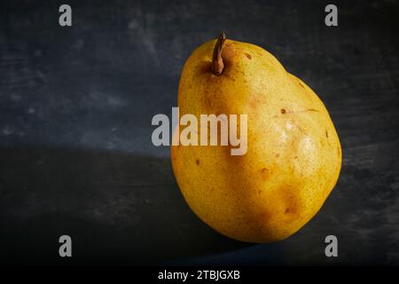 A ripe, raw, yellow pear Stock Photo