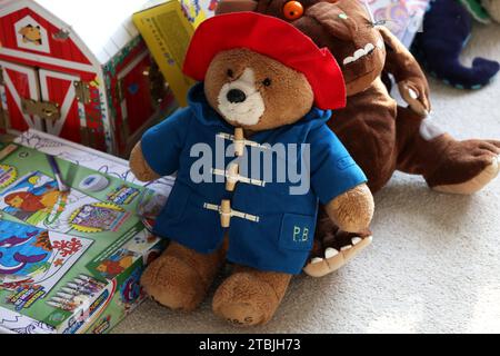 The Gruffalo and Paddington Bear teddy bears pictured in a child's bedroom in Chichester, West Sussex, UK. Stock Photo