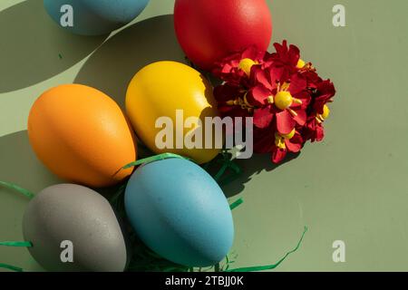 colorful eggs symbolize easter. Easter minimal concept. Creative Happy Easter, spring layout. Stock Photo