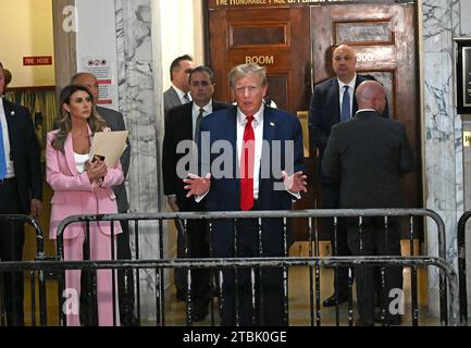 New York, United States. 07th Dec, 2023. Former U.S. President Donald Trump exits the courtroom at State Supreme Court on Thursday, December 7, 2023 in New York City. The case brought last September by New York Attorney General Letitia James, accuses Trump, his eldest sons and his family business of inflating Trump's net worth by more than $2 billion by overvaluing his real estate portfolio. Photo by Louis Lanzano/UPI Credit: UPI/Alamy Live News Stock Photo
