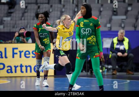 Gothenburg, Sweden. 07th Dec, 2023. Sweden's Mathilda Lundstrom (C) celebrates as Cameroon's Laeticia Petronie Ateba Engadi (L) and Issa Haoua look on during the IHF Women's World Championship handball match between Sweden and Cameroon at Scandinavium Arena in Gothenburg, Sweden, on Dec. 05, 2023.Photo: Adam Ihse/TT/code 9200 Credit: TT News Agency/Alamy Live News Stock Photo