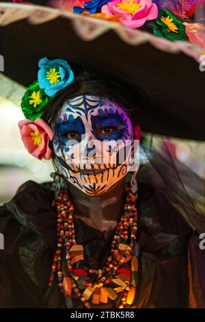 Mexico, Isla Mujures, A  woman dressed  in costume to celebrate the Day of the Dead also known as dia de los Muertos Stock Photo